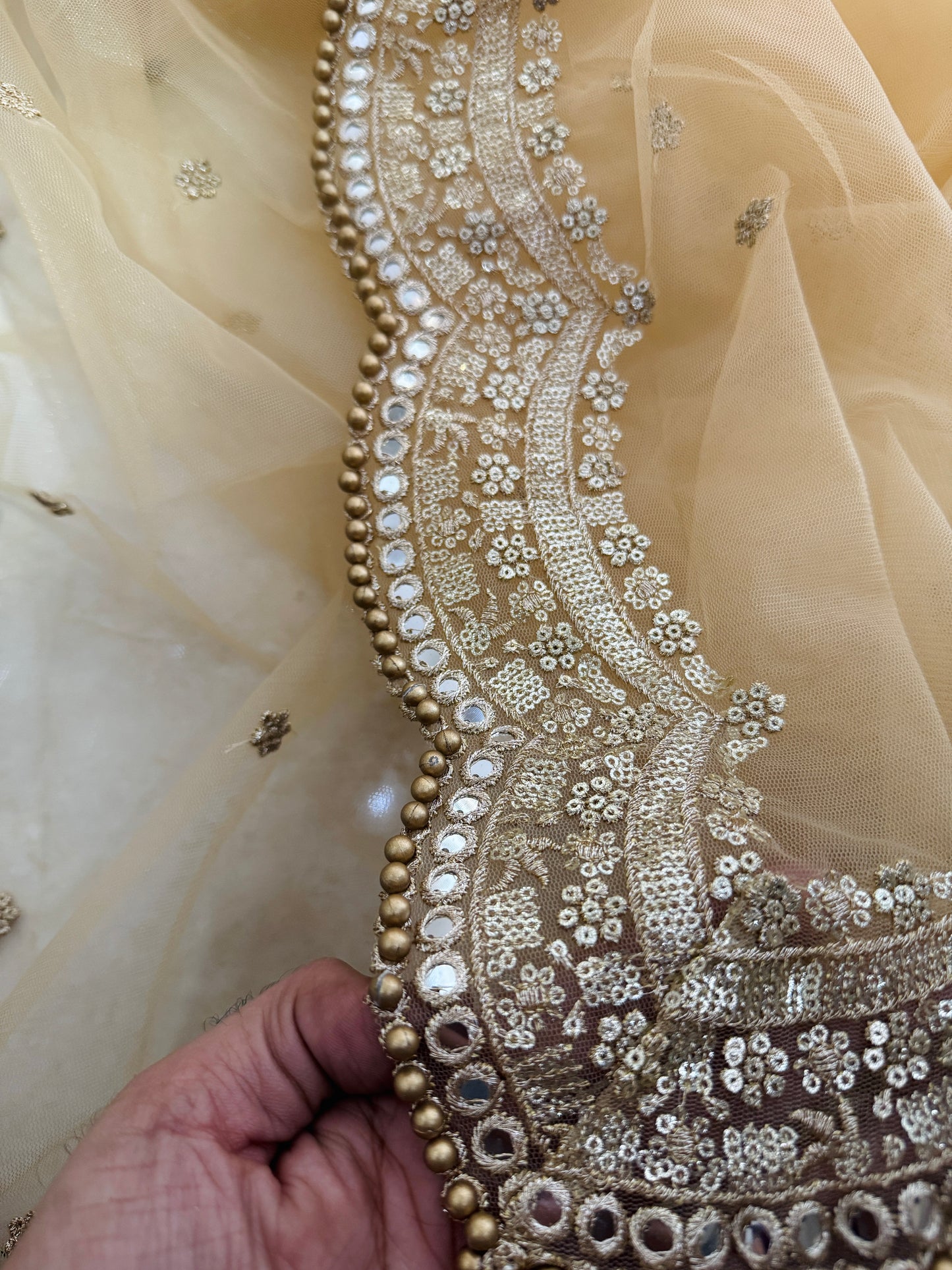 Elegant golden net dupatta for weddings by Dupatta Collections