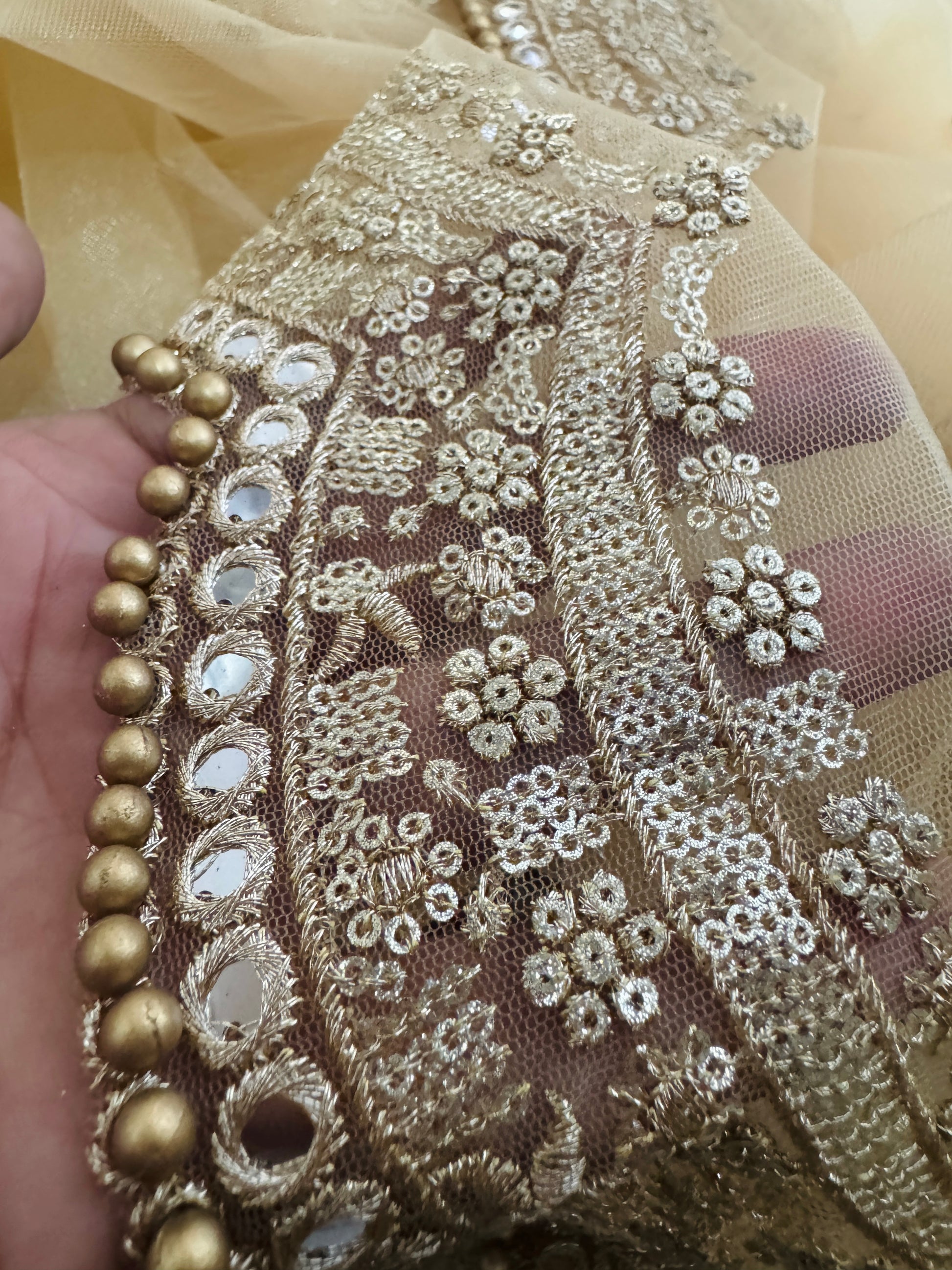 Golden bridal dupatta draped style – net fabric with zari mirror work